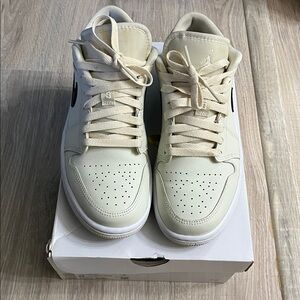 Nike Women's Sneakers in Coconut Milk with black and White accents